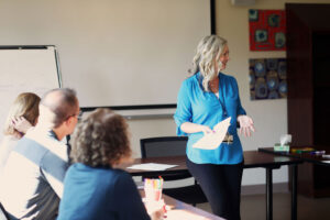 Experts facilitate a structured day treatment session for adults in a Partial Hospitalization Program.